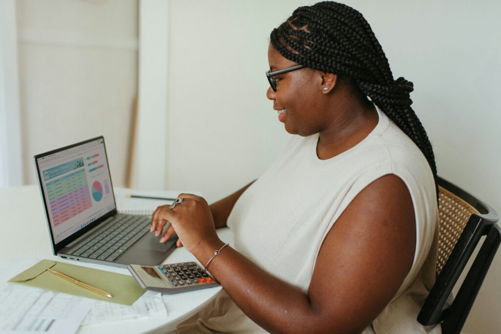 Business owner analyzing her cash flow management.