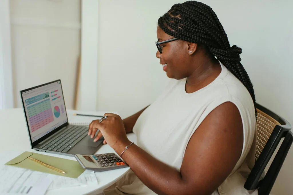 Business owner analyzing her cash flow management.