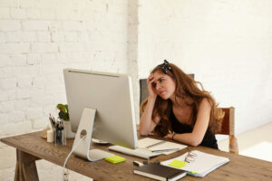 Small business owner frustrated while trying to hire employees.