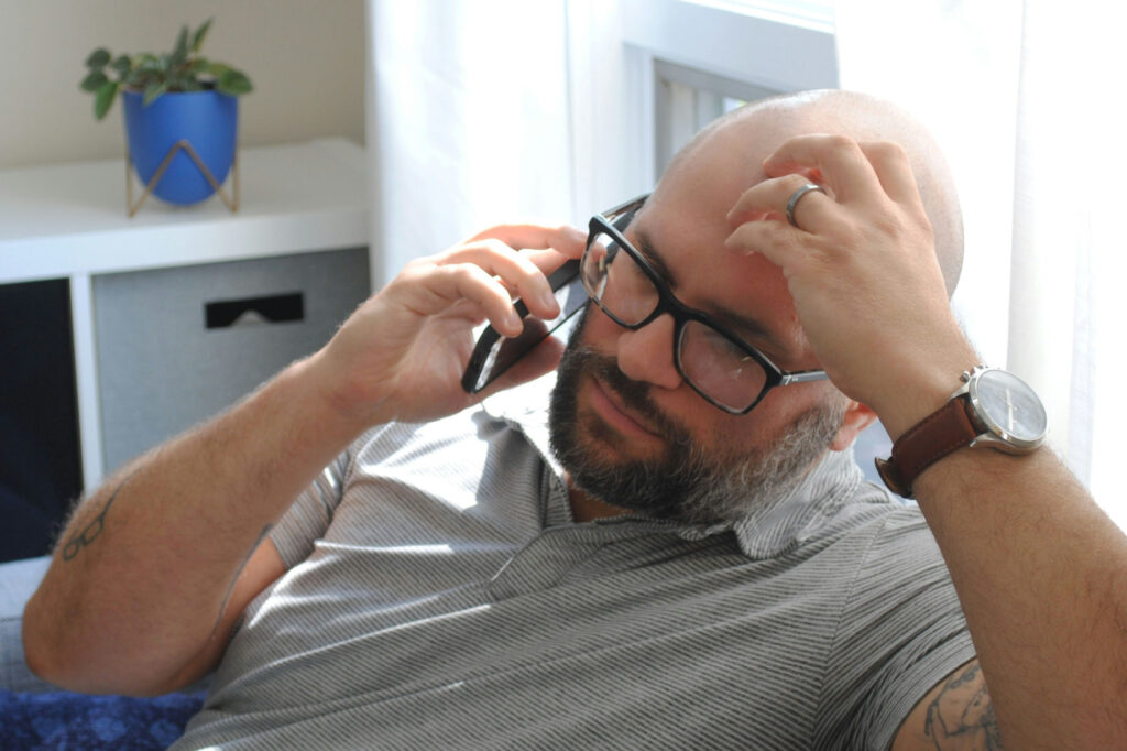small business owner on phone confused about cash flow forecast